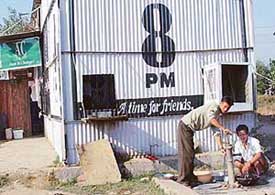 Employees at an �ahata� in Sector 46 pump out water from a hand pump in Chandigarh on Tuesday.