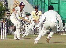 Yuvraj Singh in action during his unbeaten knock of 106 runs in the Ranji Trophy match against Delhi at the PCA Stadium at Mohali 