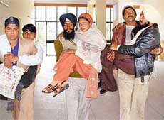 Participants being taken to an awareness conference organised by the Physically Handicapped Association