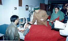 Chief Minister Virbhadra Singh enquires about the health of an accident victim, who was injured in Tuesday�s HRTC bus mishap