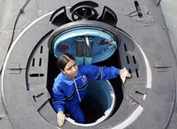 Fourteen-year-old Varsha Rehana from Kashmir exits from a naval submarine in Mumbai