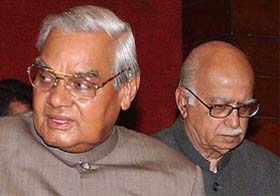 Prime Minister Atal Bihari Vajpayee with his deputy, Mr L.K. Advani, at the BJP Parliamentary Party meeting in New Delhi