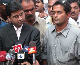 Cricketer Abhijit Kale with his lawyer outside the Mumbai High Court