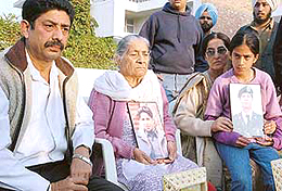 Uday Singh�s father, Lt-Col P.M. Singh (left), grandmother Anup Kaur and sister Bani at their house in Sector 18 in Chandigarh on Thursday.