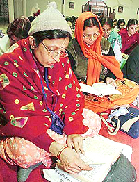 ISKCON devotees recite Geeta shalokas on the occasion of Geeta Jayanti Utsav in Hare Krishna Dham in Sector 36, Chandigarh, on Thursday. 