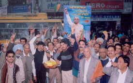 BJP workers in Ludhiana celebrate the party's victory in three states of Rajasthan, Madhya Pradesh and Chhattisgarh