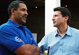 Former American decathlon champion Daley Thompson talks to legendary British middle distance runner Sebastian Coe during a meeting of the Laureus World Sports Academy Members at Lonavla
