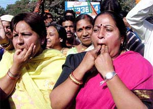 BJP supporters celebrate the party�s victory at Indore in Madhya Pradesh