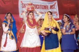 Students of SKSK Educational Institute perform giddha at the institute�s annual function