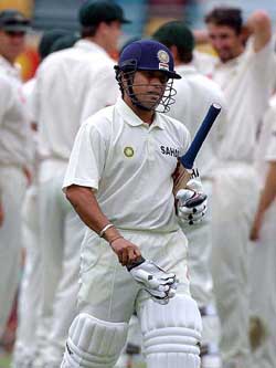 Sachin Tendulkar walks back to the pavillion after being dismissed by Jason Gillespie for a duck