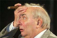 French director Claude Chabrol talks to mediapersons after he received the Lifetime Achievement Award at the 16th Annual European Film Awards 2003 in Berlin