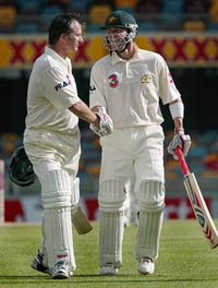 Australian Test captain Steve Waugh and team-mate Damien Martyn shake hands after Australia declared their second innings for 284 runs on the final day of the first Test against India