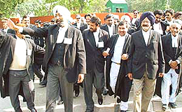 Bar Council and Association members jointly hold a protest march to present a memorandum to Governors of Punjab and Haryana in Chandigarh on Tuesday. 