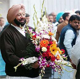 Punjab Chief Minister Capt Amarinder Singh  with flowers at the residence of Congress President Sonia Gandhi