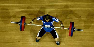 A Greek athlete makes an attempt during an international Weightlifting tournament in Athens' newly built Olympic weightlifting centre