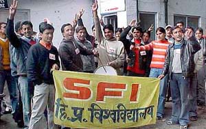 SFI activists celebrate Dr S.D. Sharma�s exit as VC on the Himachal Pradesh University campus in Shimla on Wednesday