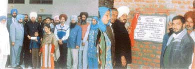 Mr Sadhu Singh, MLA, distributes cheques under the kanya jagriti scheme to the beneficiaries and lays the stone for an elementary school block at Bhadal Thuha