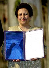 Iranian lawyer and human right activist Shirin Ebadi poses with the Nobel Diploma after receiving the 2003 Nobel Peace Prize at a ceremony in Oslo