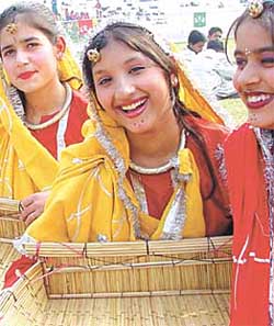 IN THEIR ETHNIC GLORY: Schoolchildren in their traditional dresses during the 24th Sports-cum-Annual Day function of Goodley Public School in the Capital on Thursday.