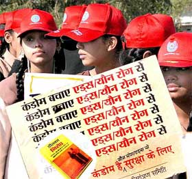 Schoolchildren take part at an awareness rally on AIDS during a state level campaign in in Bhopal 