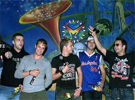 Irish band 'Westlife' perform during their visit to a music store in Mumbai