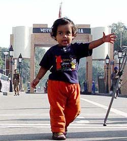 Three-year-old Ritik, a tiny member of the peace delegation of the India-Pakistan People Forum for Peace and Democracy, at the Indo-Pak joint border checkpost in Wagah
