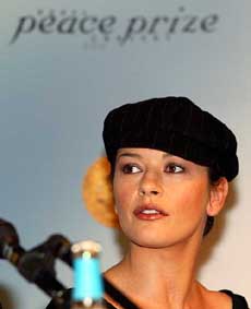 Hollywood actress Catherine Zeta-Jones listens to a question at a Press conference before the start of the Nobel Peace Prize Concert in Oslo
