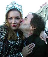 Miss World 2003, Ireland's Rosanna Davison receives a kiss from her father, singer Chris de Burgh