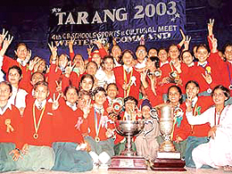 Students of Cantonment Board School, Jalandhar, with a trophy at the cultural meet 