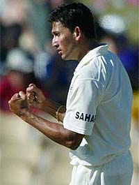 India’s Ajit Agarkar celebrates after dismissing Australia’s Stuart MacGill to end the Australian second innings