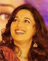 Bollywood icon Madhuri Dixit smiles at the grand finale of the Main Bhi Madhuri, a Madhuri look-alike contest, in Mumbai on Sunday evening