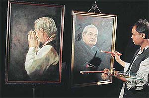 Painter Rajendra gives final touches to one of his 50 portraits of Prime Minister Atal Bihari Vajpayee. Rajendra has decided to present these portraits to Vajpayee during his forthcoming visit to Lucknow on the eve of his birthday