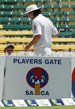 Australia's Jason Gillespie walks off the field injured