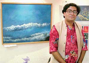 Prabal Pramanik at an exhibition of his paintings being held at IndusInd Art Gallery, Sector 8, Chandigarh on Wednesday. 