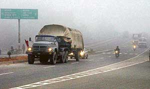 A view of thick fog on the national highway in Ambala on Wednesday.