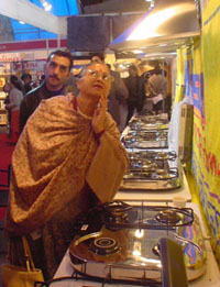 A visitor admires consumer products at the CII fair in South City