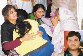 Relatives of the deceased jeweller, Anil Aggarwal (inset), wail at Bharat Nagar in Ludhiana on Sunday