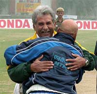 India Veterans captain Syed Kirmani hugs his Pakistani counterpart Sadiq Mohammed 