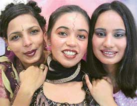 City girls decked up in gold, silver and copper for a New Year�s eve bash at a cosmetics centre