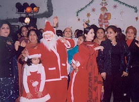 Members of the Roopika Ladies Club, Ludhiana, celebrate Christmas