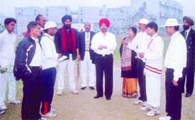 Chairman of Bhagat Singh College Balbir Singh conducts the toss in the presence of principal Dr Jitinder Kaur before the opening match of the Shaheed Bhagat Singh Inter-College Cricket Tournament