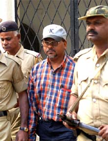 Dr Regan Baig, brother of Karnataka Minister for Small Scale Industries Roshan Baig, being taken to a Bangalore court