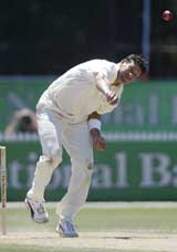 New Zealand's Daryl Tuffey bowls on his way to taking five wickets on the fourth day 