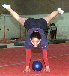 A gymnast practises for the 44th Senior National Gymnastics Championship