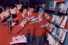Students of BCM Arya Model Senior Secondary School, Shastri Nagar, go through books at a fair in Ludhiana 