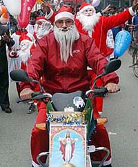 Men dressed as Santa Claus take out a procession ahead of Christmas Day in Amritsar