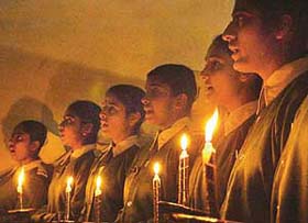 A lamp-lighting ceremony marks the initiation of students into nursing at Chandi Mandir