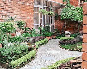The front garden has been designed keeping in mind the principles of Feng Shui