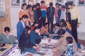 Participants try different techniques of painting at a workshop in Ludhiana