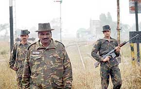 BSF Jawans patrol the rail track near Attari